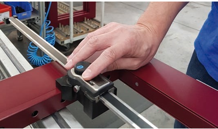 Inspection of an aluminum frame with a TESA TWIN-CAL IP67 horizontal scale unit.
